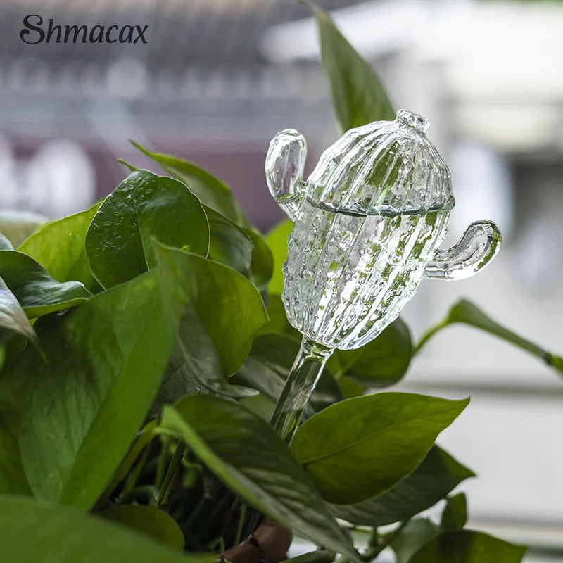 🟡 Alimentador de agua de plantas de vidrio, dispositivos de autorriego automáticos de dibujos animados, sistema de riego por goteo, herramientas de riego para el hogar